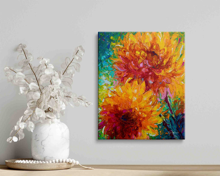 Orange wall art canvas print of dahlia painting on shelf with minimalist white decor.