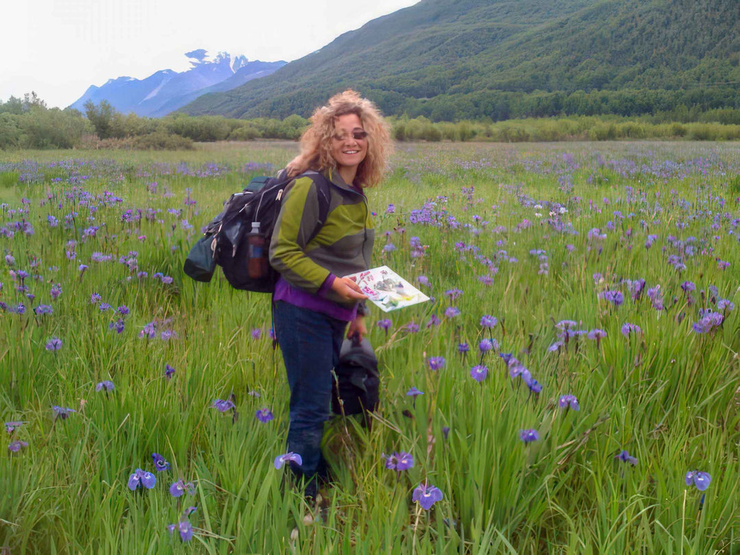 Alaskan modern impressionist artist in in iris field flower landscape