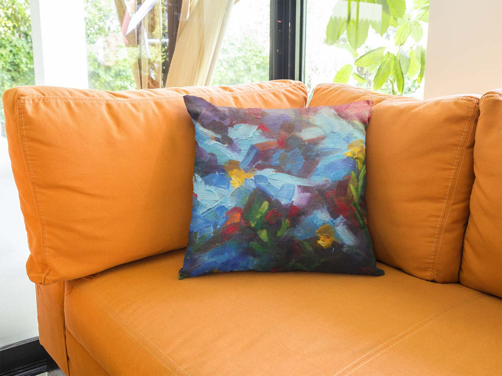square throw pillow on an orange sofa living room impressionist blue poppies artwork by talya johnson