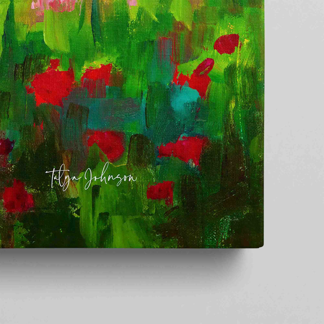 Close up detail of artist printed signature on a Dahlia Evening canvas print featuring a white farmhouse and trees behind a field of colorful dahlias in the afternoon light. 