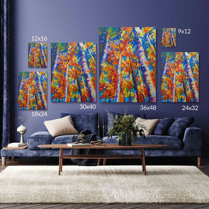 Size reference guide for Redemption Fall Birch orange wall art canvas print including 9x12, 12x16, 18x24, 24x32, 30x40, 36x48 inches hanging above blue sofa on blue wall decorated with contemporary decor.