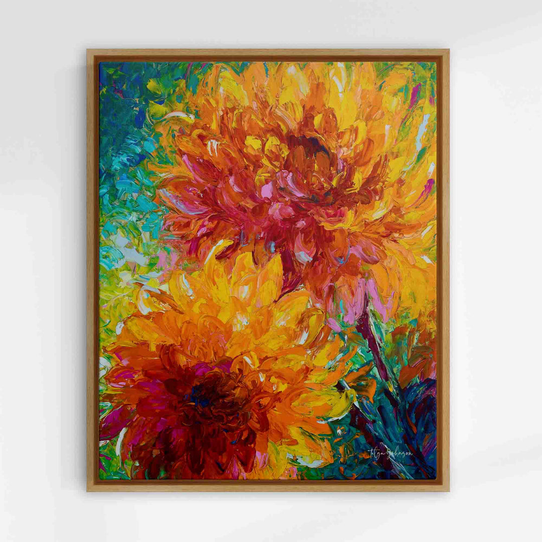 Natural wood floater frame with orange wall art canvas print giclee of intertwining orange dahlia painting with yellow and red and magenta centers painted on an abstracted blue green background.