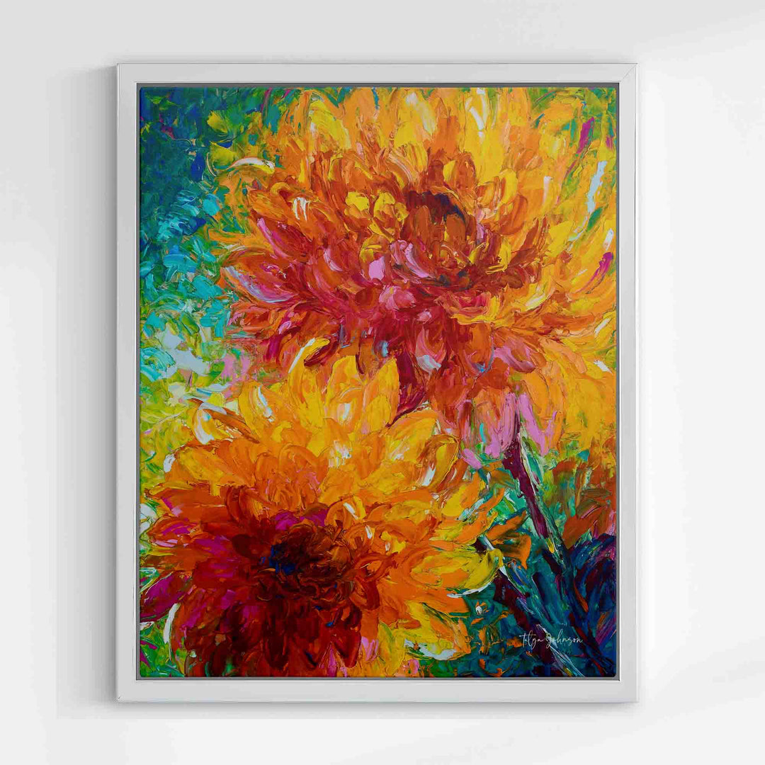 White floater frame with orange wall art canvas print giclee of intertwining orange dahlia painting with yellow and red and magenta centers painted on an abstracted blue green background.