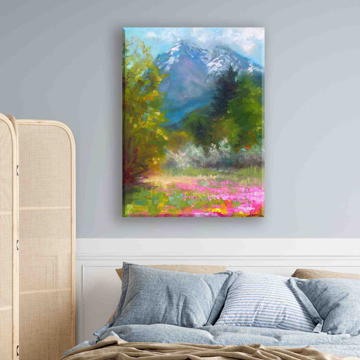 Large Canvas Wall art of Alaskan landscape wildflower field in front of Pioneer Peak, original painted by contemporary impressionist Talya Johnson hanging on bedroom interior wall.