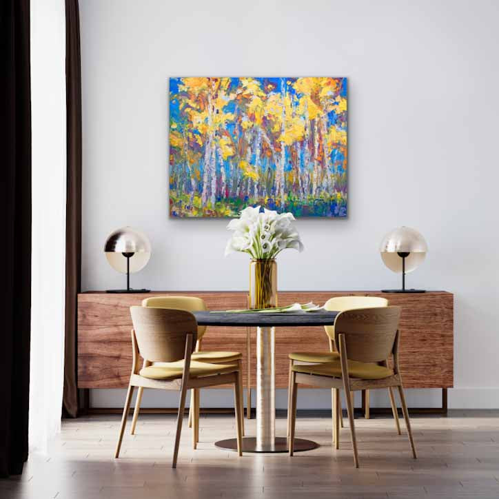 Last Stand: Aspen and birch tree impressionist canvas print in yellow and blue by Talya Johnson hanging in interior wall