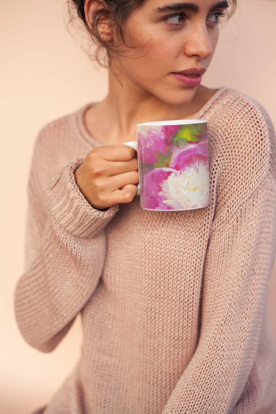 Bowls of Beauty - Alaskan peonies artistic coffee mug mockup held by a woman wearing a cozy sweater 