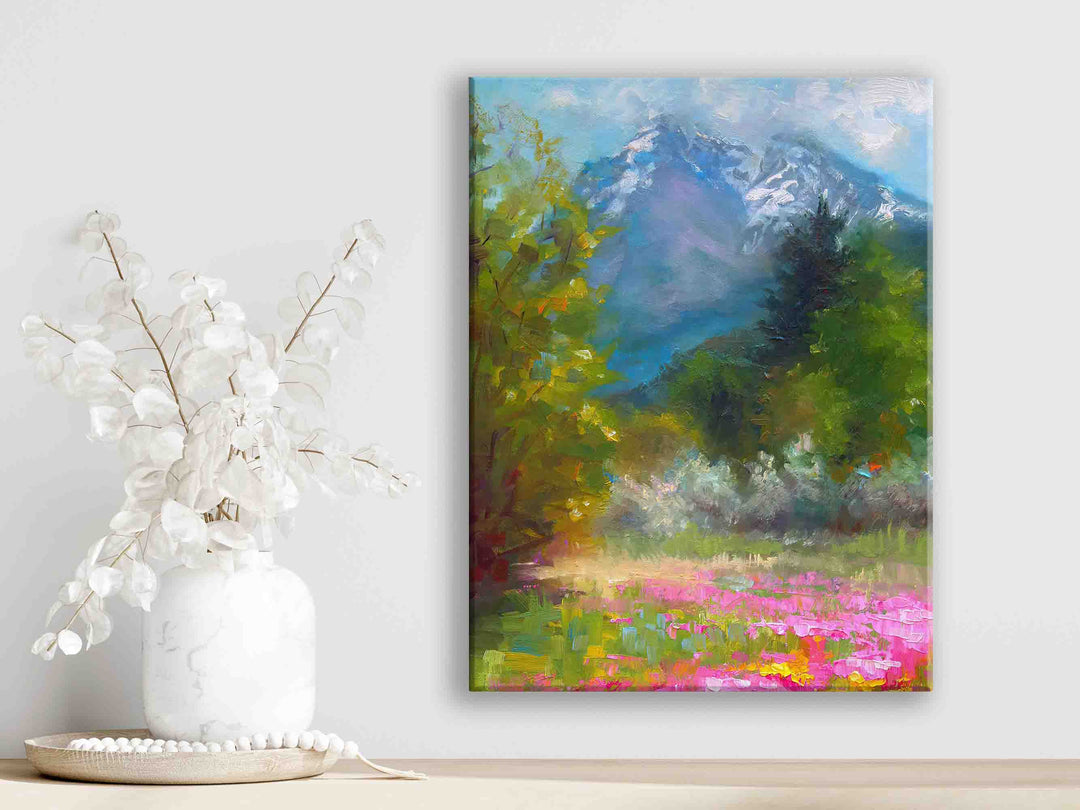 Large Canvas Wall art of Alaskan landscape wildflower field in front of Pioneer Peak, original painted by contemporary impressionist Talya Johnson hanging over shelf wall.